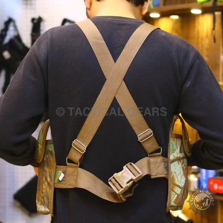 Tactical utility belt with suspenders and two camouflage holsters in brown camo style