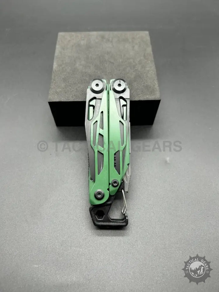 Closed stainless steel 14-in-1 multi-tool with carabiner clip and bit set