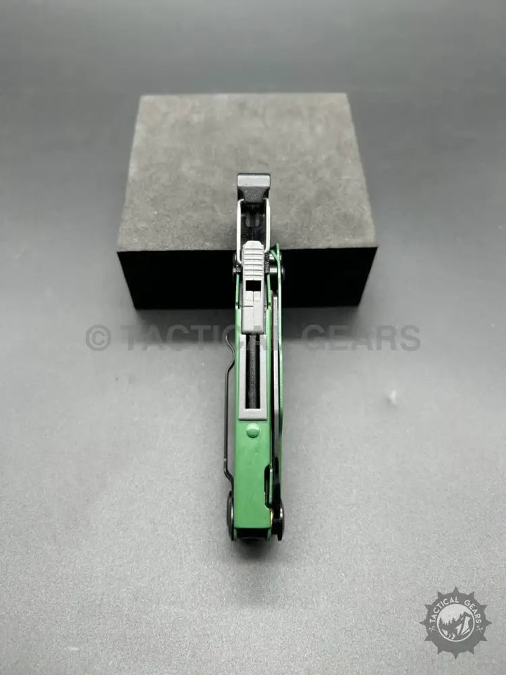 Bright green and silver Stainless Steel Multi-Tool with pliers and bit set for versatility