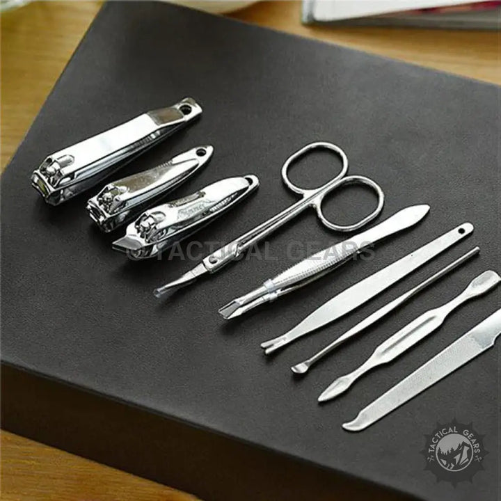 Shiny steel nail grooming tools from Nailed IT Complete Manicure Kit, including a nail clipper
