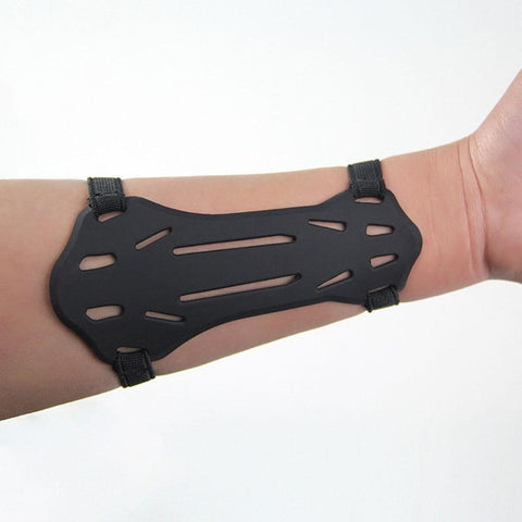 Black archery armguard worn on a female archer’s forearm for protection and support