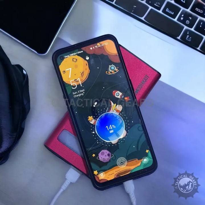 Smartphone with space-themed lock screen connected to 20000mAh fast charging power bank with LED light