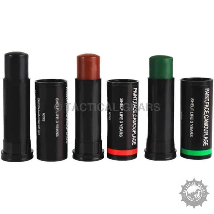 Camouflage face paint sticks in black, brown, and green with matching caps for creative face art