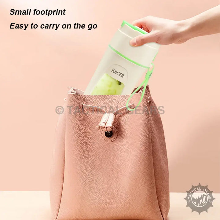 Portable 340ml Citrus Juicer Machine inside pink handbag, perfect juicer machine on the go