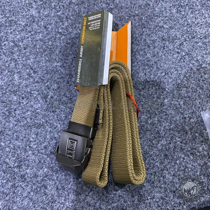 New tan 5.11 Tactical Belt with coiled design and black belt buckle in packaging
