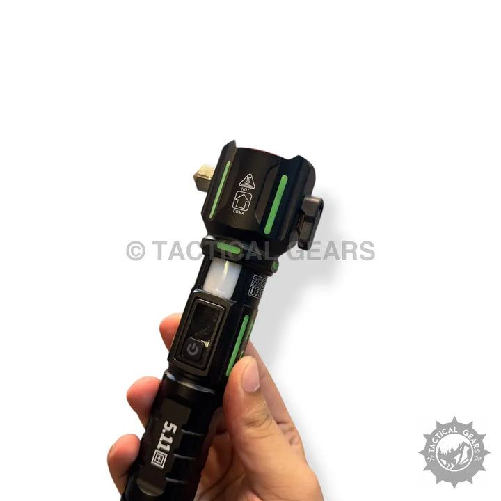 Black tactical emergency flashlight with green accents and 1km range for outdoor use