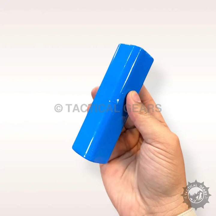 Hand holding a bright blue hexagonal solid rod for 5000 Lumens White Laser Flashlight