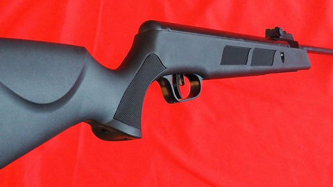 Black High Force Silenced Air Rifle with textured grip and safety feature