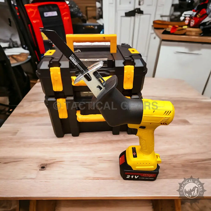 Yellow and black 21V rechargeable cordless reciprocating saw with black blade in Tools Set