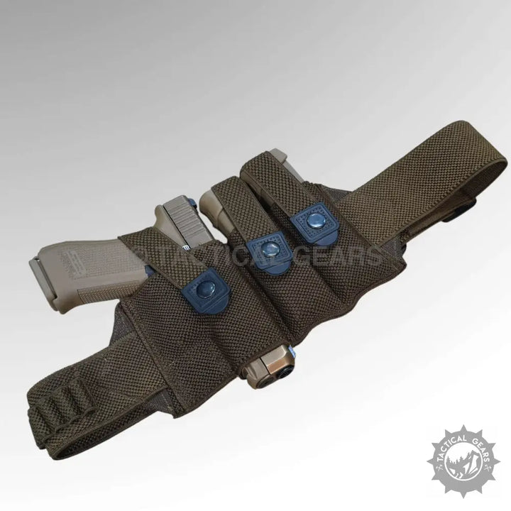 Tan pistol in dark green 9mm belt holster with two magazine pouches for 9mm belt