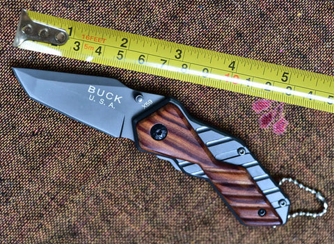 USA X59 Tactical foldable pocket knife with dark gray blade and wood handle