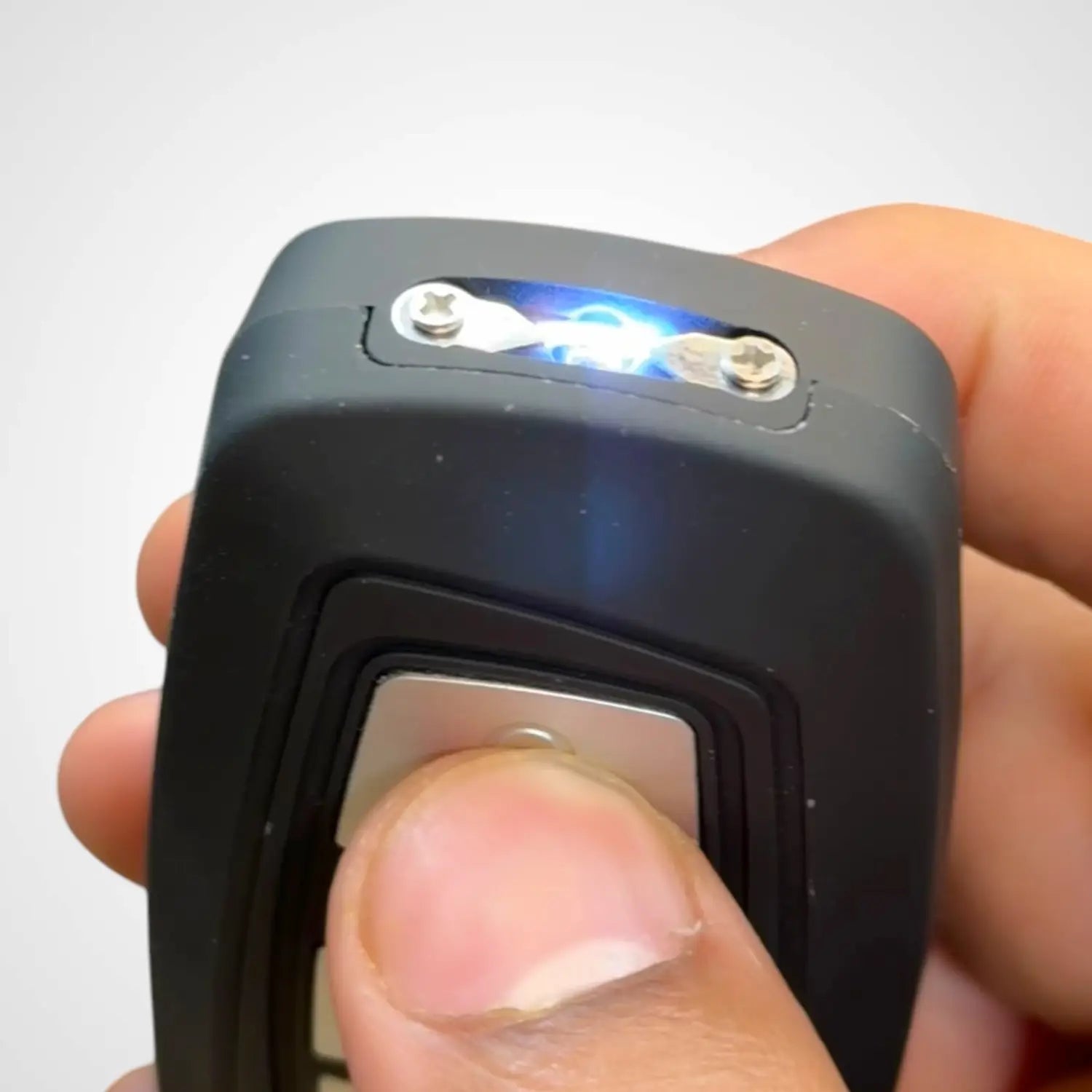 Black BMW Key Fob 3-in-1 stun tool with active electrical discharge for self-defense