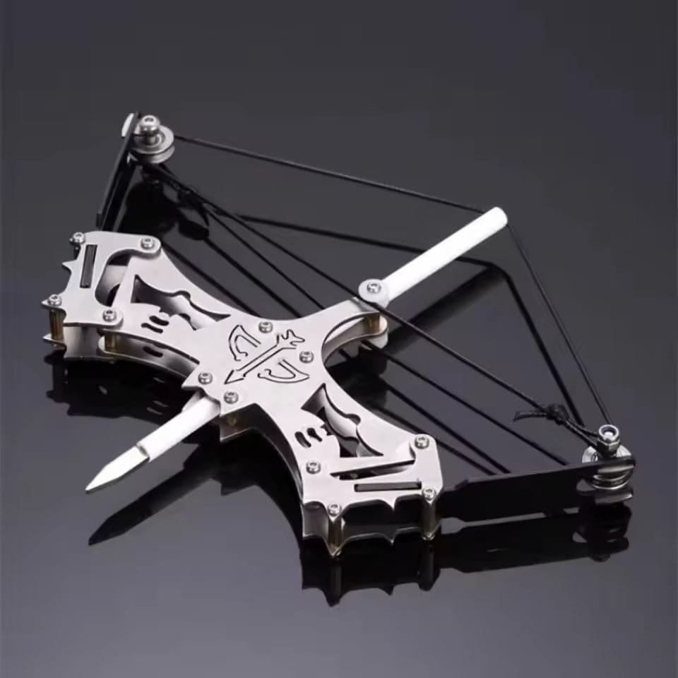 Mini compound bow with white limbs and black string in Metallic Mini Compound Bow Set