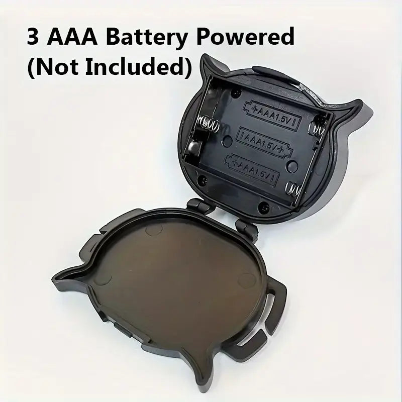 Open black plastic battery compartment shaped like a cartoon cat head for Rechargeable WT209 headlight