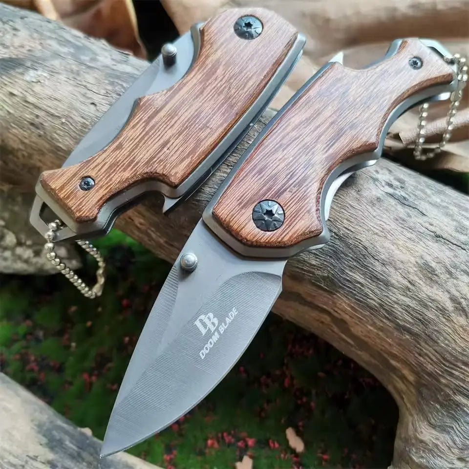 Buck X74 folding knives with wooden handles and metal chain for outdoor use