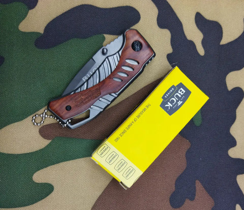 Buck USA X61 Tactical folding knife with wood-grain handle and metal blade