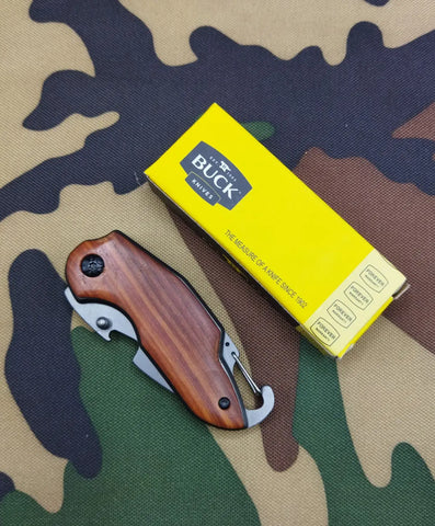 Buck X48 folding knife with wood handle, carabiner clip, and bottle opener