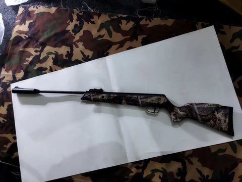 Camouflage-patterned High Force Silenced Air Rifle with Safety and black barrel