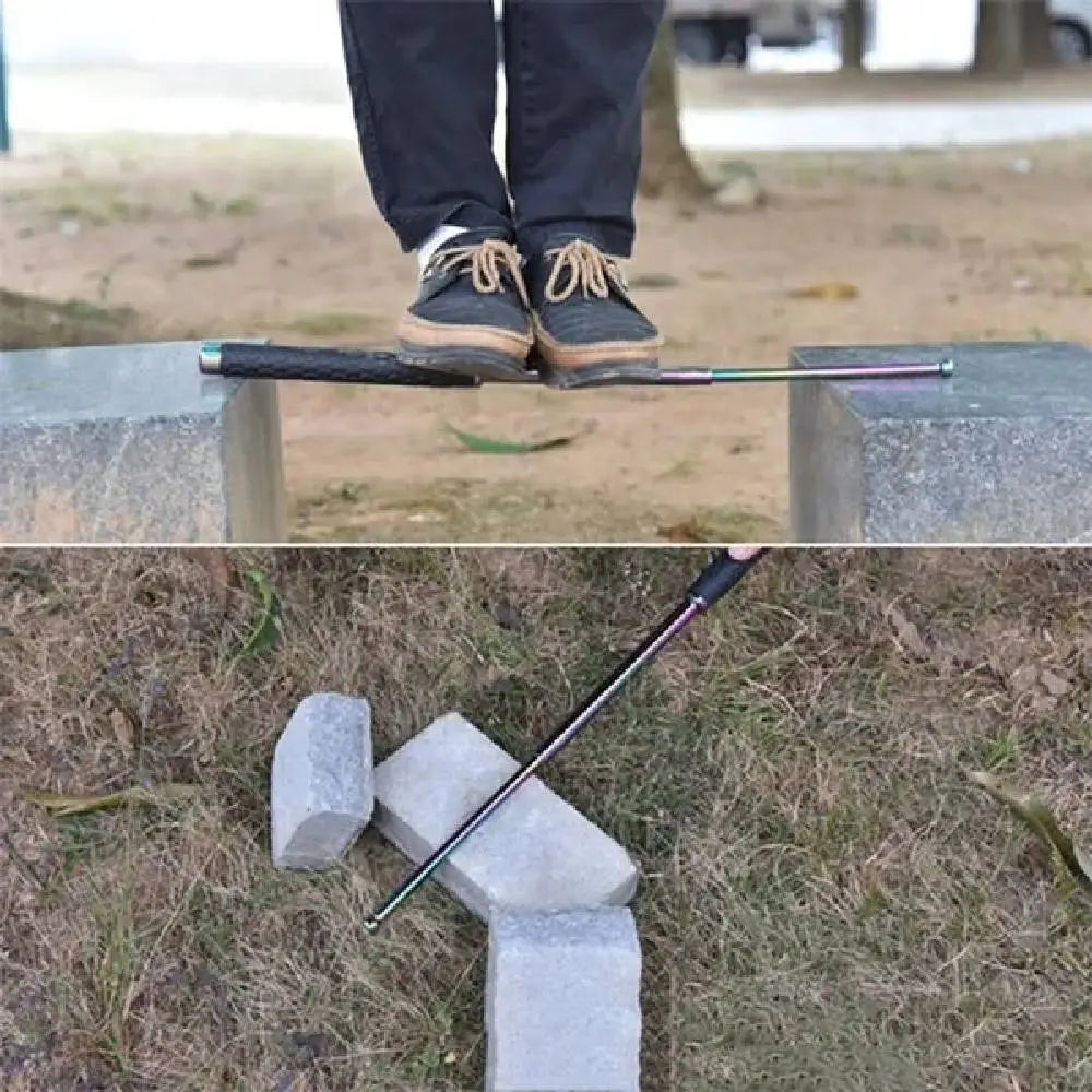 Telescoping metal baton with PVC material, supporting weight and resting on rocks