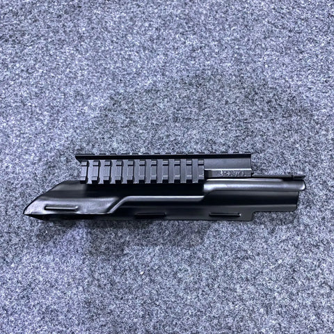 Black metal AK-style quad rail handguard with integrated Picatinny rail for tactical use