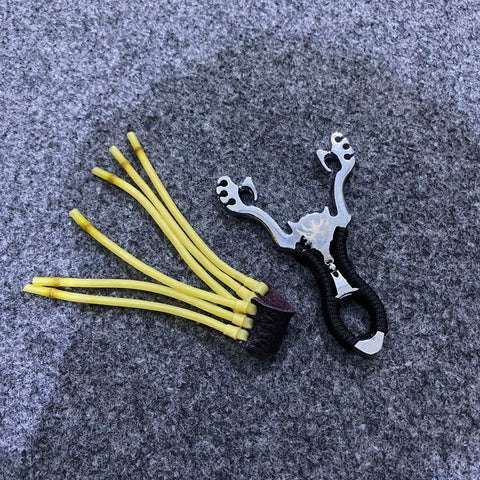 Aluminum slingshot with black ergonomic grip and yellow elastic bands for precision shooting