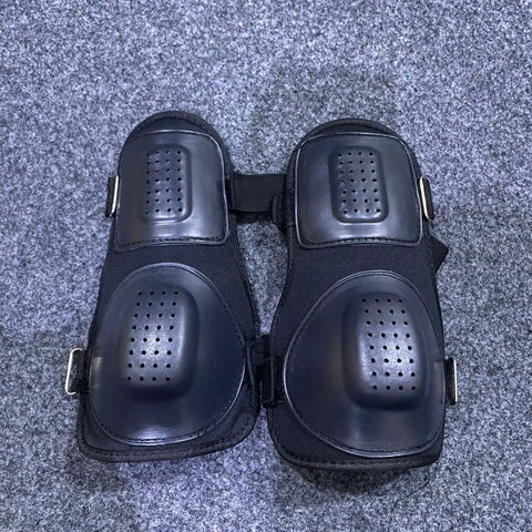 Black knee protective pads for tactical use, featuring durable knee and shin guards