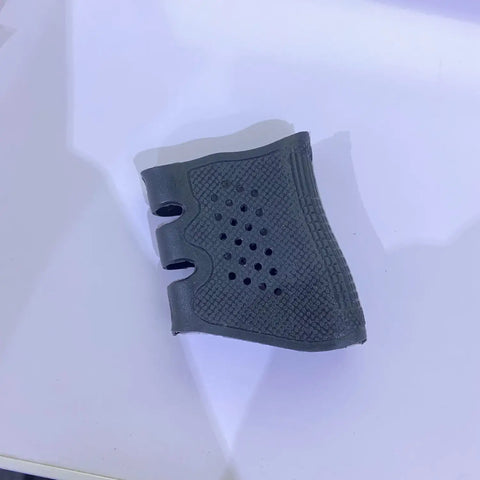 Black textured pistol rubber grip sleeve with finger grooves from Tactical Pistol Rubber Grip Pack