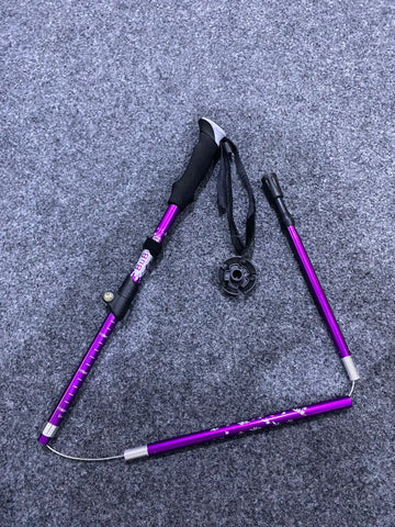 Foldable purple Bubuda hiking stick with black grip, part of the Bubuda hiking accessories