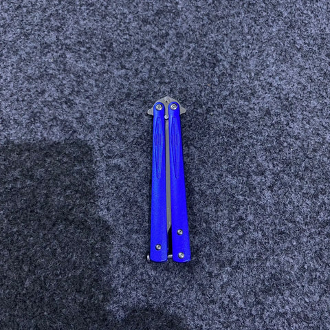 Blue butterfly knife trainer with black sheath, approximately 8 inches long, safe practice tool