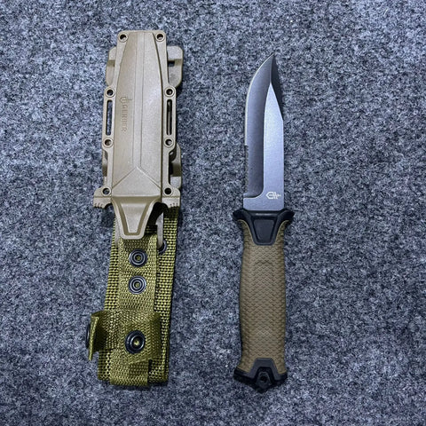 Gerber Fixed Blade Tactical Knife with tan blade, black handle, and olive green sheath