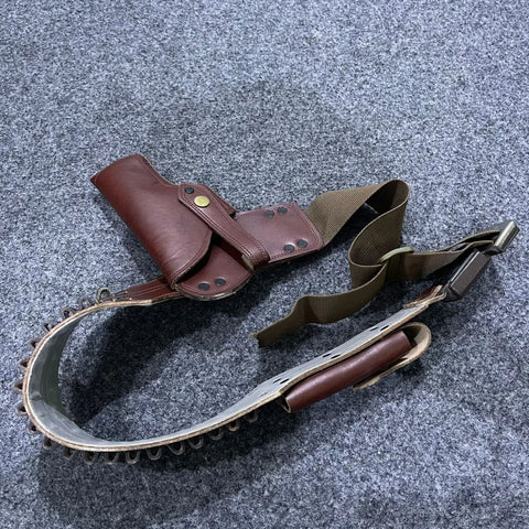 Vintage brown leather hip holster with attached cartridge belt for leather hip holster style