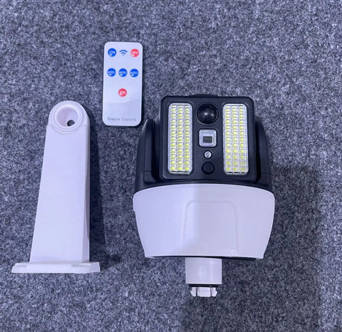 White and black Solar Motion Security Light with Remote Control for outdoor security