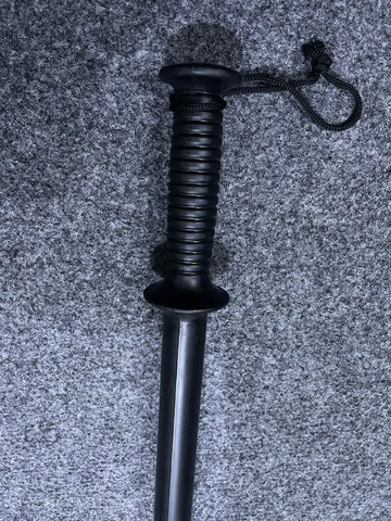 Black polymer security baton with ribbed non-slip grip and wrist strap for safety