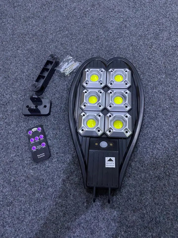 Solar LED Motion Sensor Street Light with bright LEDs, adjustable arm, and remote control