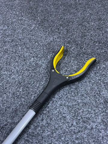 Black and yellow objects grabber with gray handle, Extended Objects Grabber Reacher Tool