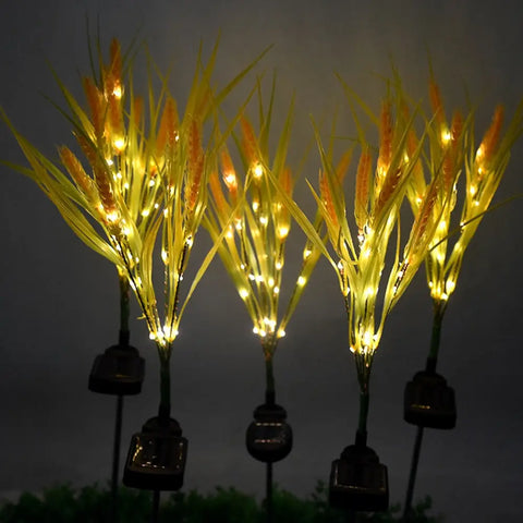Wheat Solar Powered Garden Lights: Five glowing solar powered wheat or cattail outdoor decorations