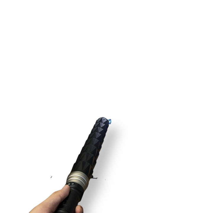 Black textured alloy electric baton with electric current at tip for self-defense