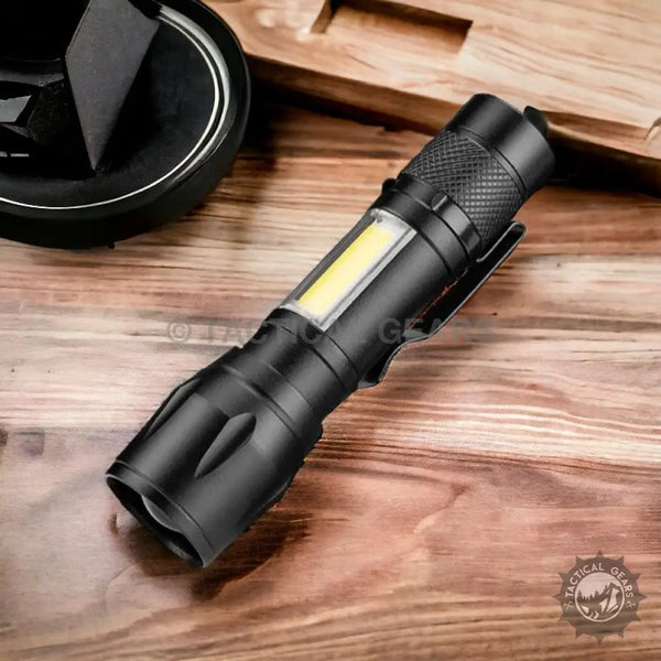 Black aluminum alloy tactical flashlight with side COB light and pocket clip, LED light