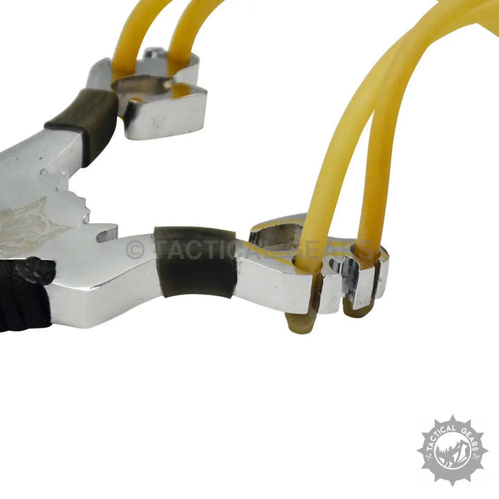 Aluminum slingshot with yellow elastic bands and black ergonomic grip for hunting