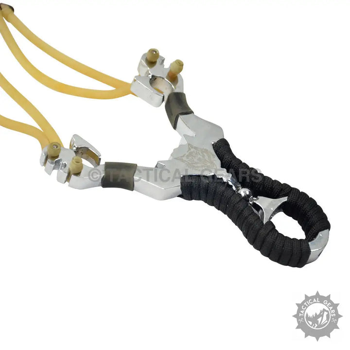 Aluminum slingshot with black ergonomic grip and yellow elastic bands for hunting