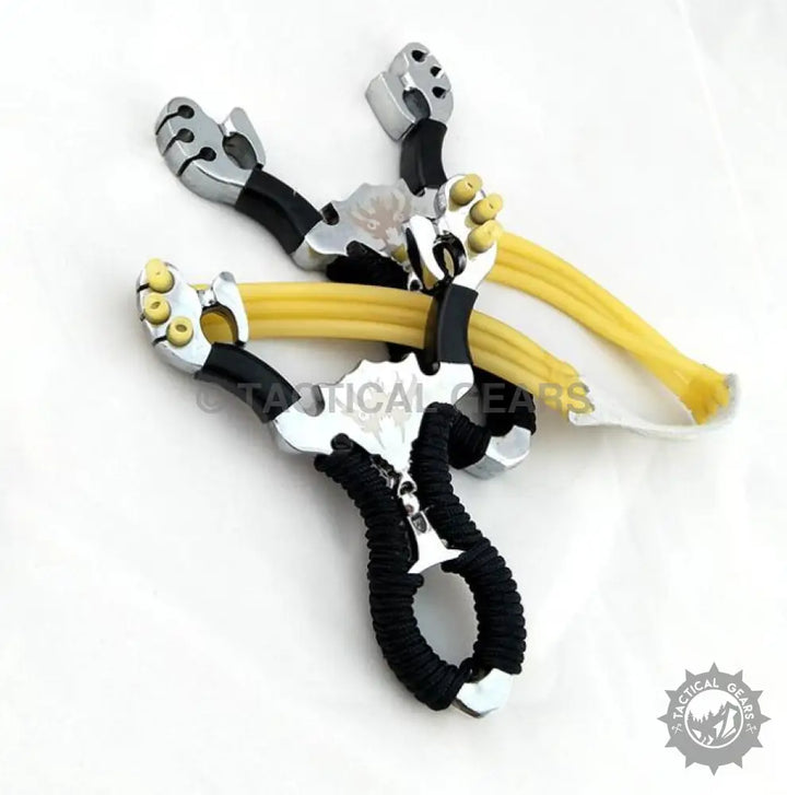 Aluminum slingshot with black ergonomic grip and yellow elastic bands for hunting