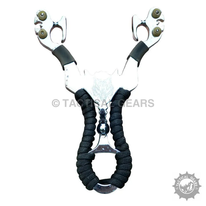 Aluminum slingshot with black ergonomic grip and green-tipped prongs for hunting