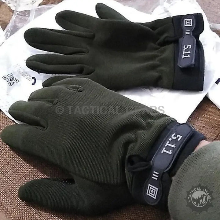 Dark green anti-skid gloves with black wrist straps for shooting and gym activities