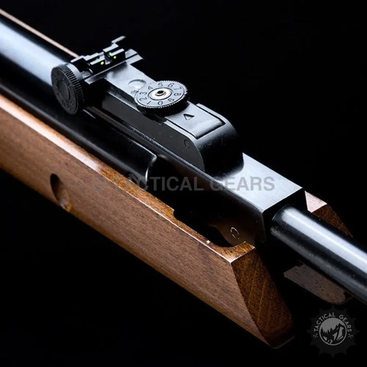 Close-up of Artemis SR-1250W airgun with dark metal barrel and wooden stock