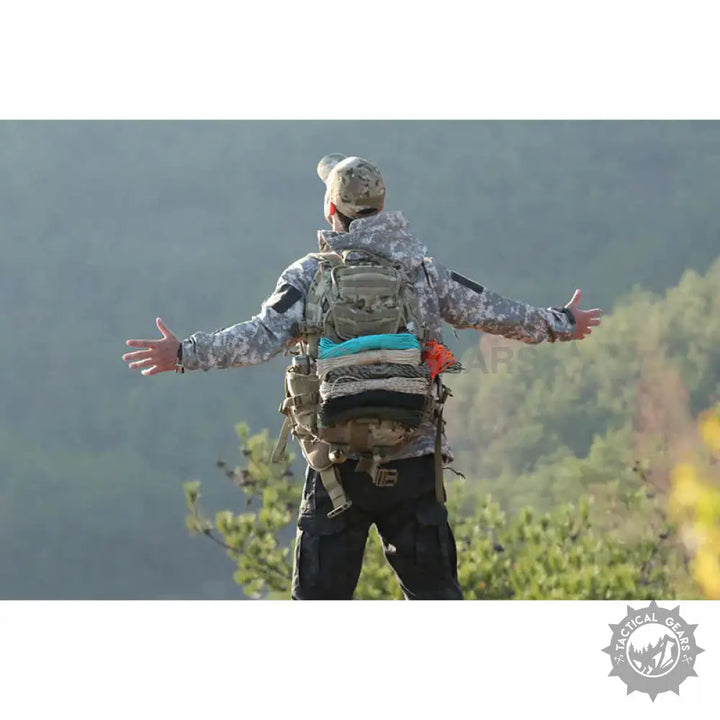 Person in camouflage tactical gear with backpack showcasing 4mm paracord rope for survival