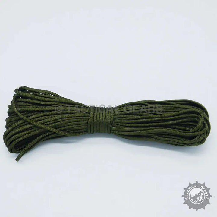 Coiled olive green 4mm paracord rope for camping, crafting, and outdoor use