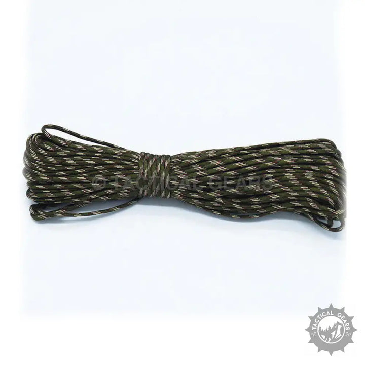 Dark green and tan camouflage 4mm paracord rope coiled and tied in the middle