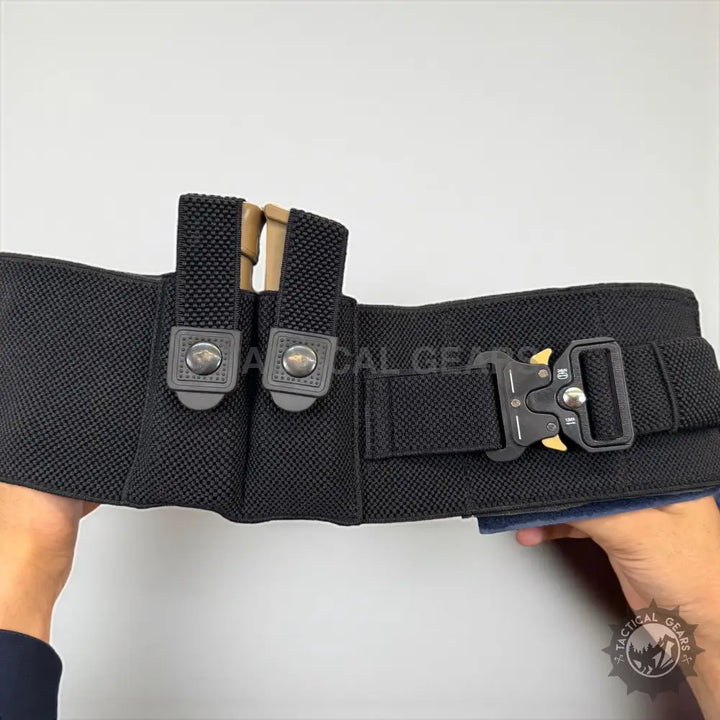Black tactical belt with magazine pouches for concealed carry and everyday carry essentials