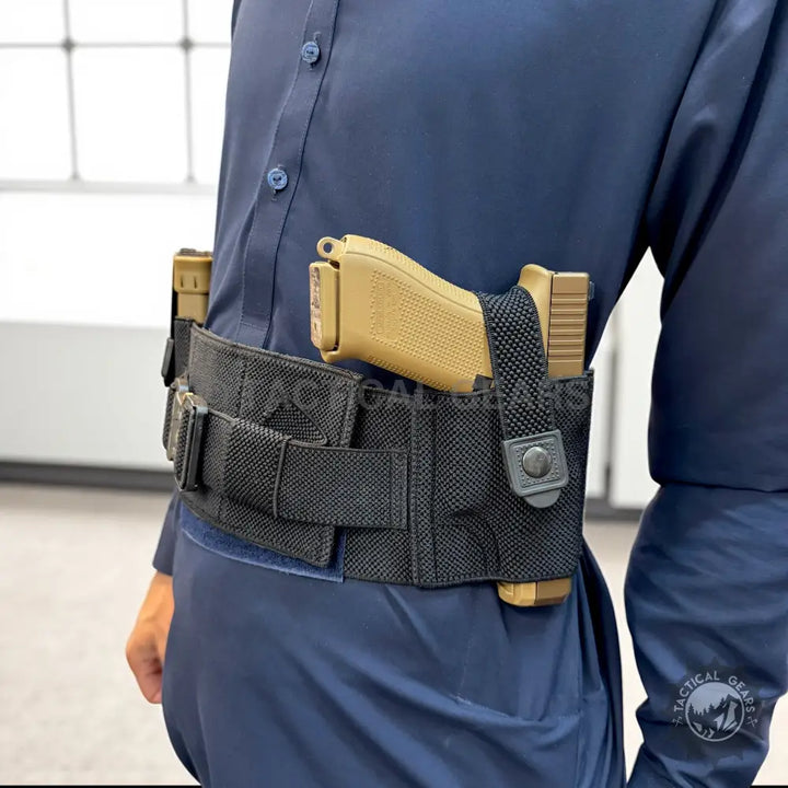 Tan pistol in black tactical holster with magazine pouches for concealed carry and everyday carry essentials