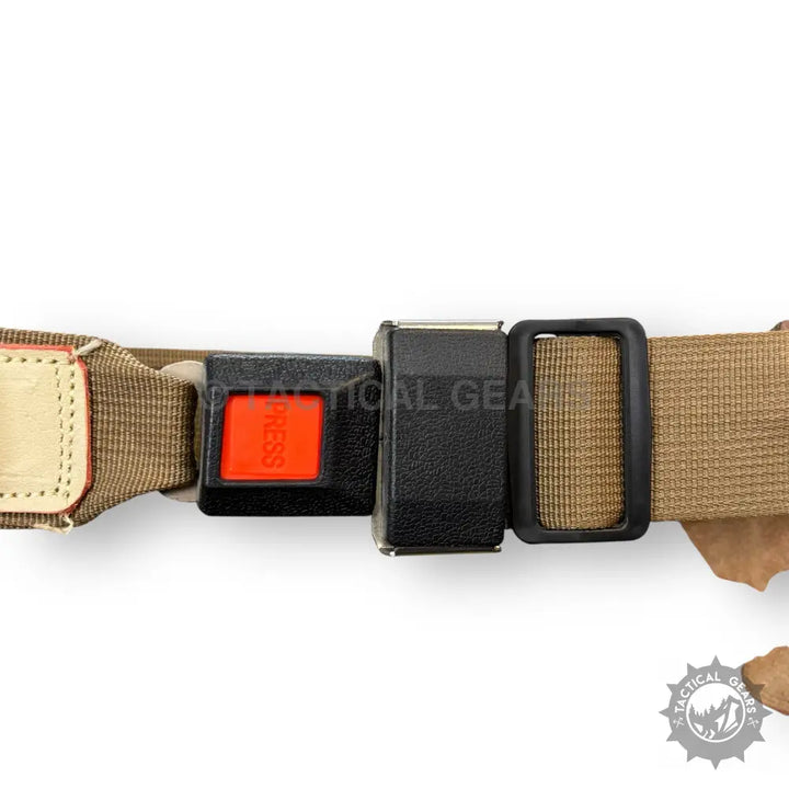 Tan nylon webbing strap with black plastic metal quick-release buckle and ammo loops